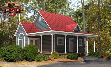 grey house with red metal roof|gray house with dark trim.